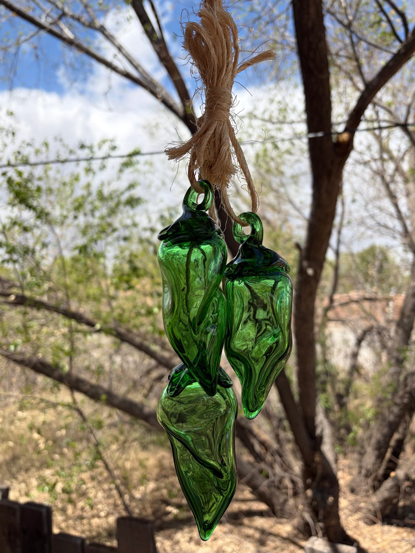 Broken Arrow Glass Recycling emerald green handblown recycled glass chile pepper ristra hanging on rustic twine